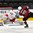 GRAND FORKS, NORTH DAKOTA - APRIL 24: Denmark's Kasper Krog #1 makes a save against Latvia's Emils Gegeris #20 in a shoot out during relegation round action at the 2016 IIHF Ice Hockey U18 World Championship. (Photo by Matt Zambonin/HHOF-IIHF Images)

